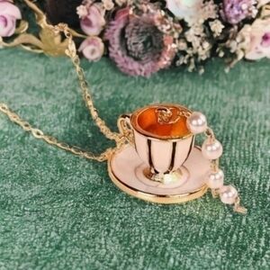 BETSEY JOHNSON SPILLING TEACUP ENAMEL NECKLACE